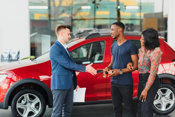 Happy Woman Receiving New Car Her Husband Dealership — Stock Photo, Image