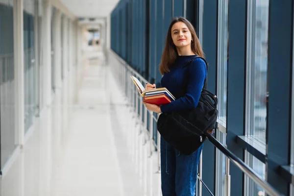 Positivity Beautiful Girl Smiling Camera Standing Corridor Notes Backpack Going — Stock Photo, Image