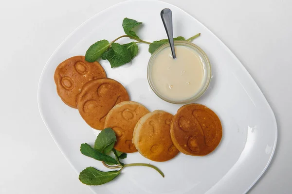 children\'s menu. pancakes with sweet sauce