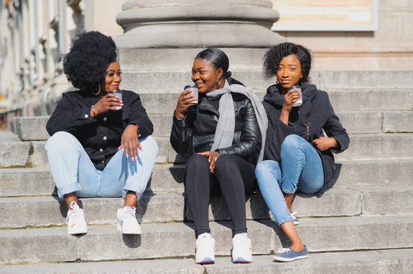 Three Stylish African American Girls Drinking Coffee Street Having Fun — Stock Photo, Image