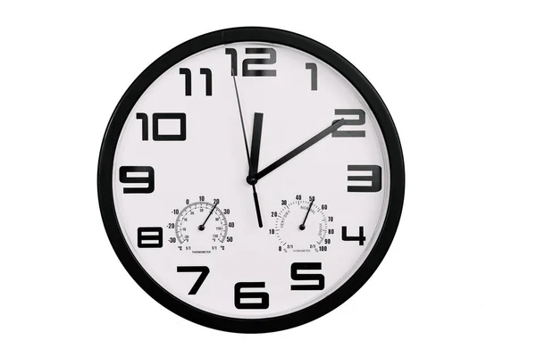 単純な古典的な黒と白の丸みを帯びた壁の時計は白で隔離された 壁にアラビア数字の時計は12 10を示しています — ストック写真