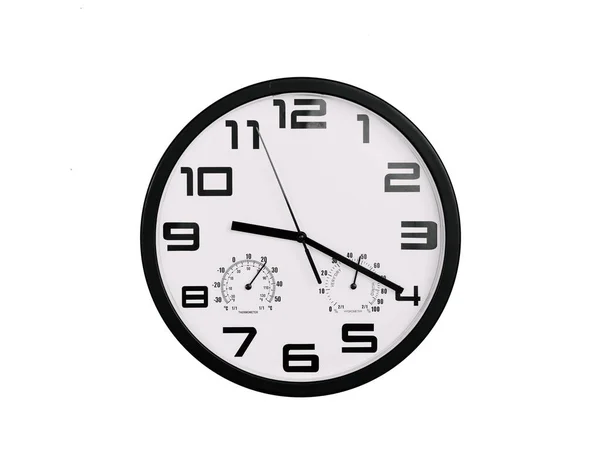 単純な古典的な黒と白の丸みを帯びた壁の時計は白で隔離された 壁にアラビア数字の時計は9 20を示しています — ストック写真