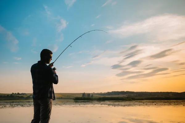 Риболовля Обертається Заході Сонця Силует Рибалки — стокове фото