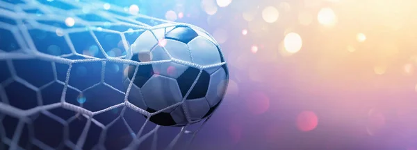 Bola de futebol no gol. Fundo multicolorido — Fotografia de Stock
