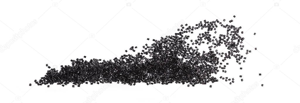 black plastic granules composition on white background
