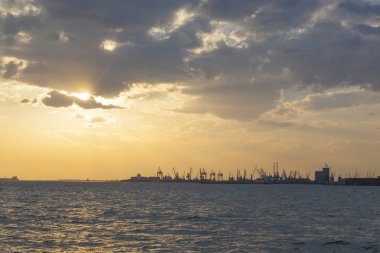 Sunset on the background of the port in greece