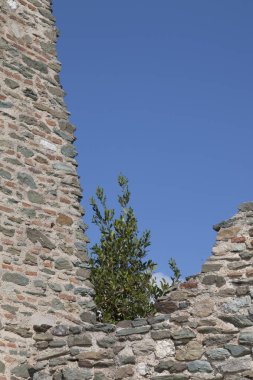 Ancient walls and a blue sky in Greece