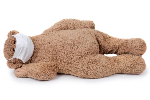 Teddybeer Ligt Ziek Met Een Coronavirus Een Medisch Masker Een — Stockfoto