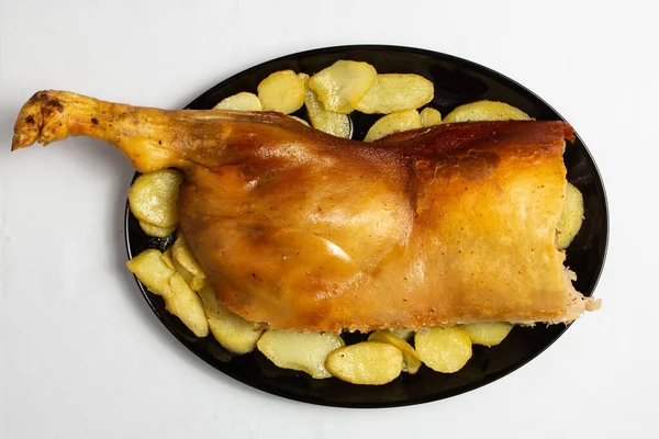 Tipik domuz budu. Geleneksel İspanyol Castilla y Leon Segovia tarifi. Cochinillo asado