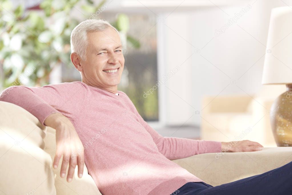 senior man relaxing at home 