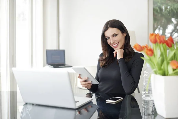 Businesswoman using touchpad — Stock Photo, Image