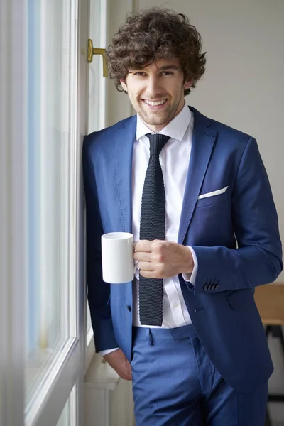 Businessman drinking coffee — Stock Photo, Image