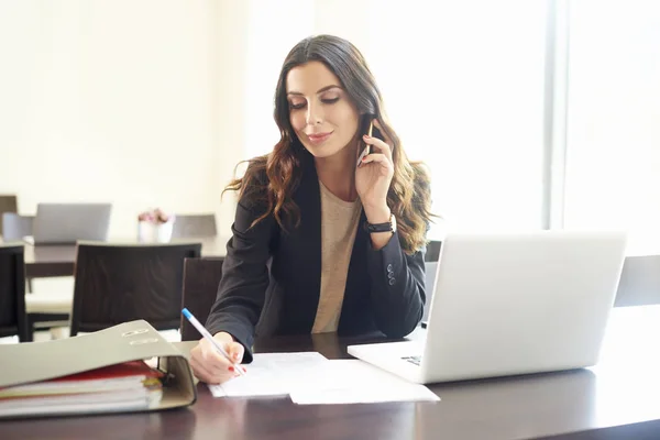 Young financial assistant at work — Stock Photo, Image