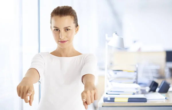 Woman pointing with her finger — Stock Photo, Image