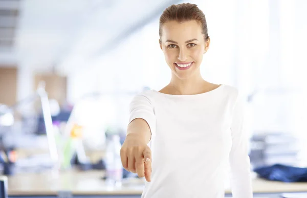 Woman pointing with her finger — Stock Photo, Image