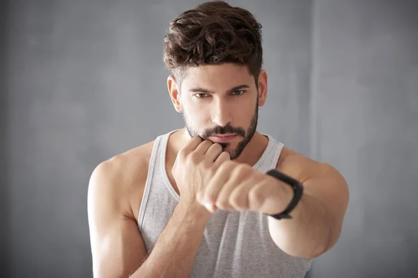 Young boxing man in a gym — Stock Photo, Image