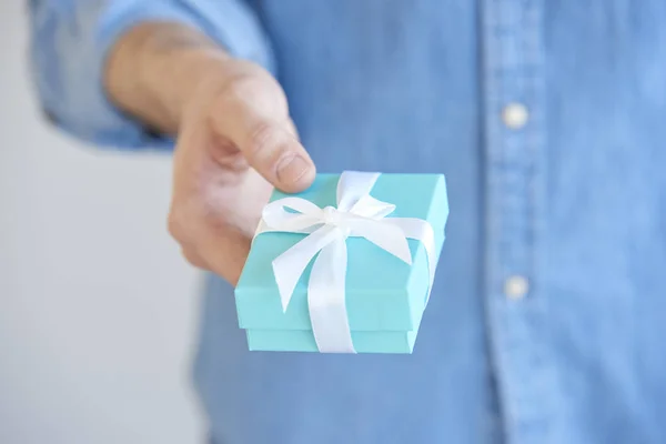 Close Man Holding Present Box His Hand Give — Stock Photo, Image