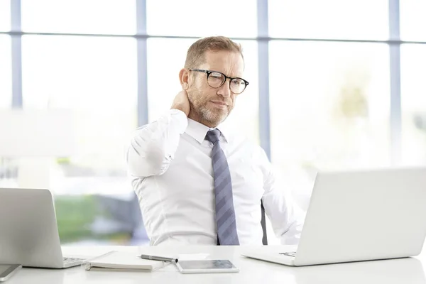 Stressed Middle Aged Financial Businessman Sitting Desk Working Laptops Office — Stock Photo, Image