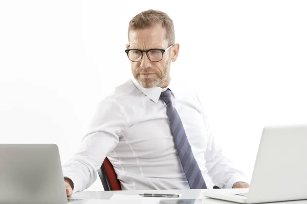 Stressed Middle Aged Businessman Sitting Office Desk Working Computers Isolated — Stock Photo, Image