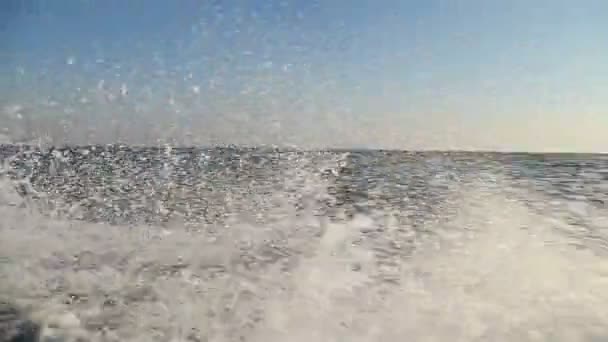 Sea spray on floating trays — Stock Video