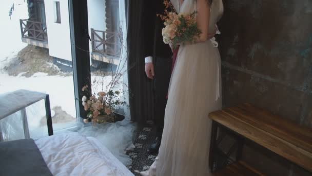 Young couple stands near the window — Stock Video