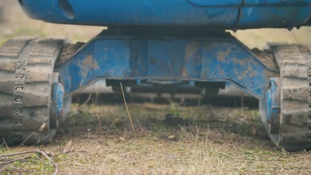 Close-up of a rubber track of a small excavator — Stock Footage Close-up of a rubber track of a small excavator Stock Footage