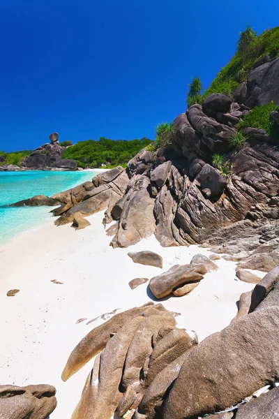 Island, beach, boulders, turquoise sea, Thailand Stock Photo