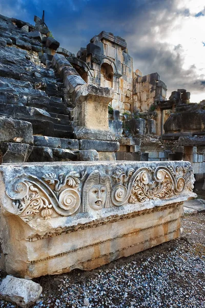 The antique relief on the stone Amphitheater. Turkey. — Stock Photo, Image