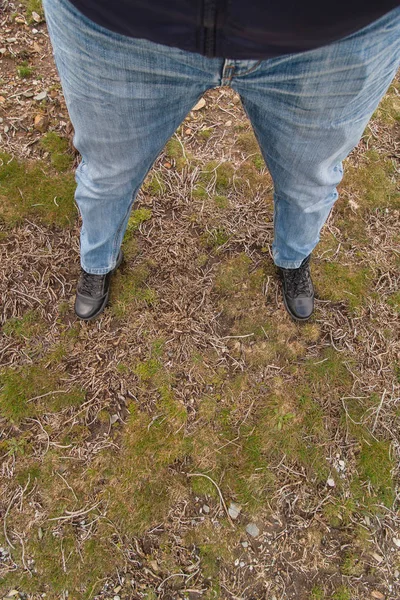 Legs standing on grass — Stock Photo, Image