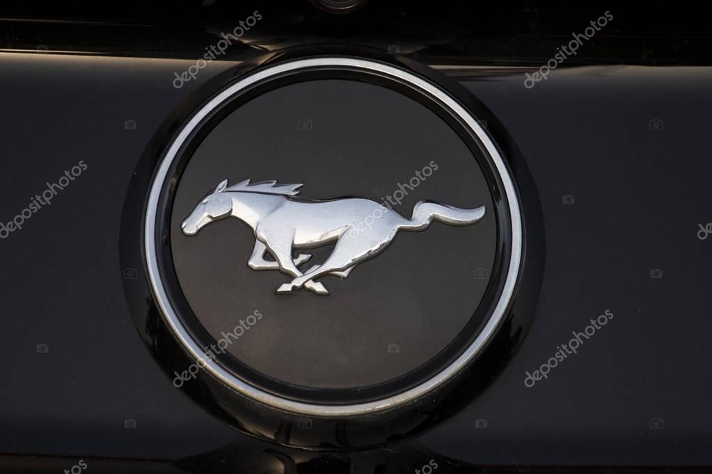 FARO, PORTUGAL - AUGUST 27, 2016: Close up view of Ford Mustang car brand logo