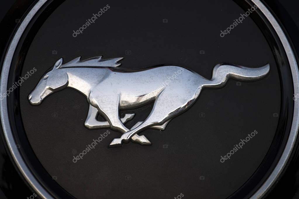 FARO, PORTUGAL - AUGUST 27, 2016: Close up view of Ford Mustang car brand logo
