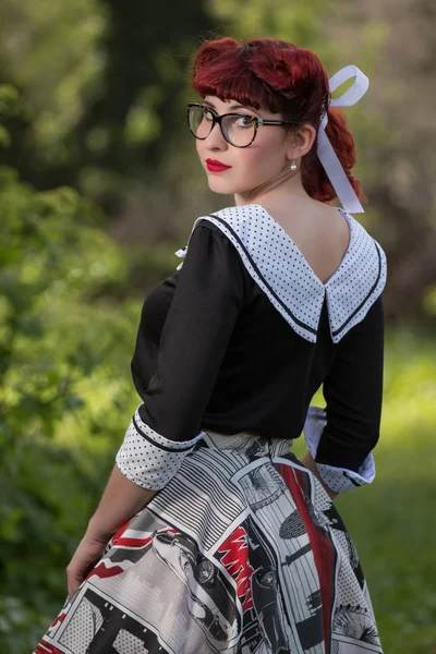 Pinup female on nature — Stock Photo, Image