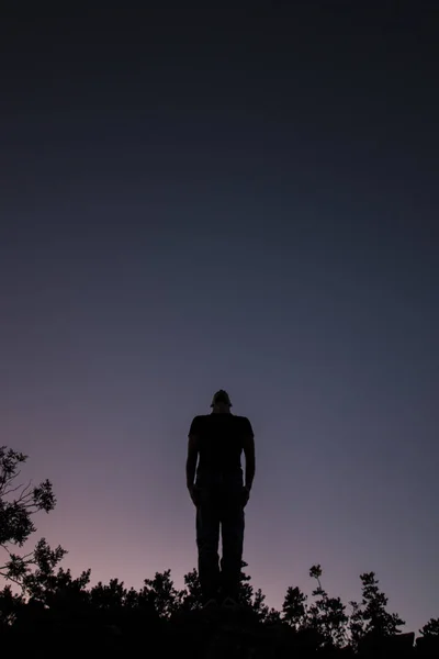 Top of hill man silhouette — Stock Photo, Image
