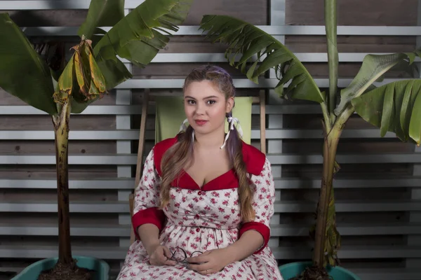 Cute pinup girl in the beach bar — Stock Photo, Image