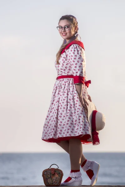 Cute pinup girl with red and white dress. — Stock Photo, Image