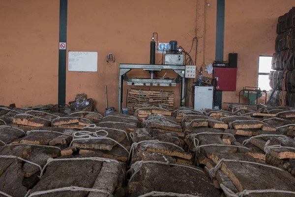 Cork factory interior with many cork bales — Stock Photo, Image