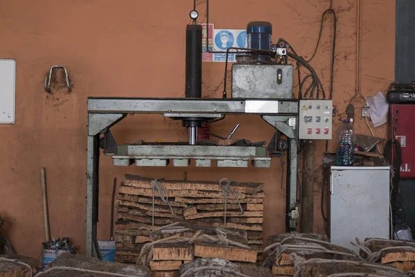 Cork factory machinery to create cork bales — Stock Photo, Image