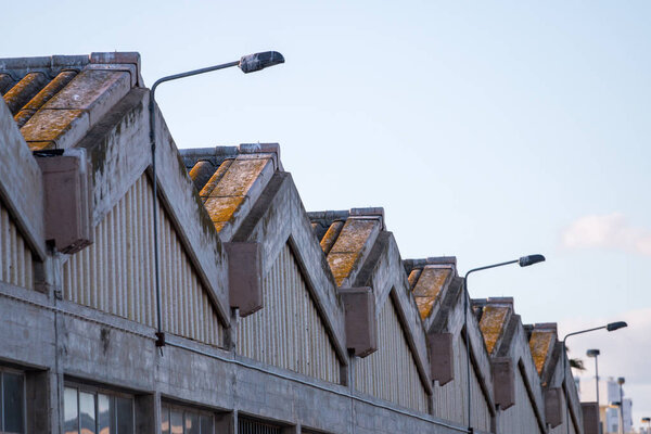 View of details from rooftops from a large abandoned factory.