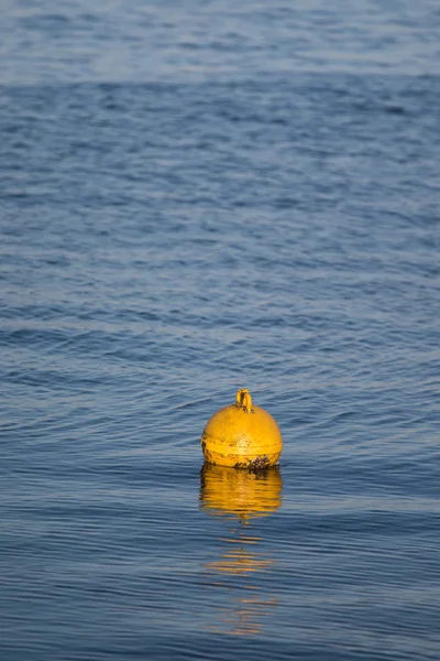 Yellow warning buoy — Stock Photo, Image