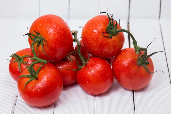 Välsmakande högen av våta tomater — Stockfoto