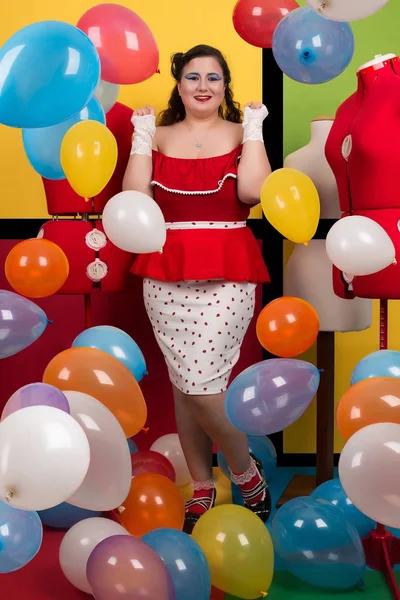 Pinup girl on a balloon party — Stock Photo, Image