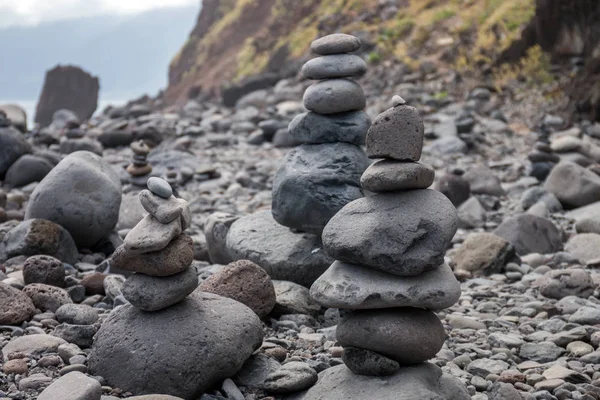 Balanced stones on beach