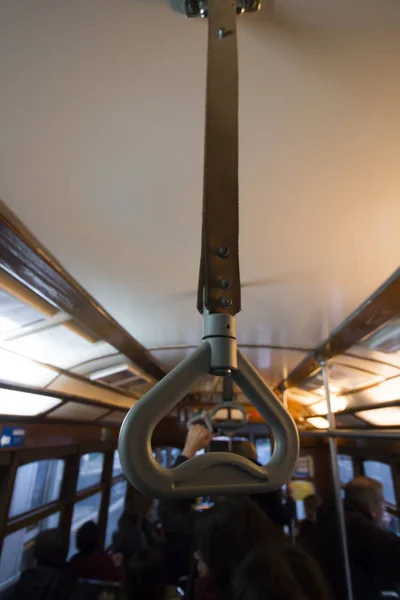 Commuter handle on a historical yellow tram — Stock Photo, Image