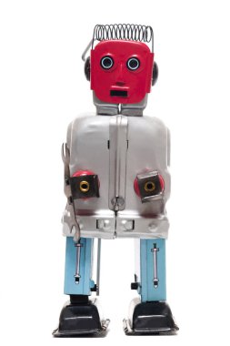Beyaz bir arka plan üzerinde izole vintage retro kırmızı yüzü teneke oyuncak robot.