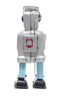 Beyaz bir arka plan üzerinde izole vintage retro kırmızı yüzü teneke oyuncak robot.
