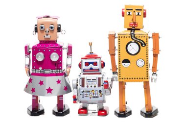 Beyaz bir arka plan üzerinde izole vintage retro teneke oyuncak robot aile kavramı.