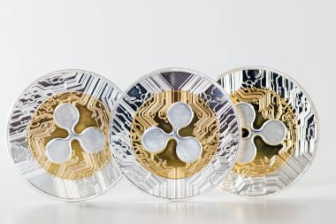 Shiny ripple coins on a white background.