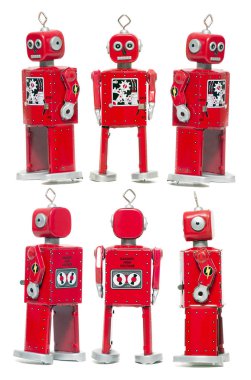 Beyaz bir arka plan üzerinde yalıtılmış bağbozumu retro kırmızı teneke oyuncak robot.