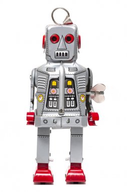 Beyaz arka planda izole edilmiş klasik bir robot oyuncak..