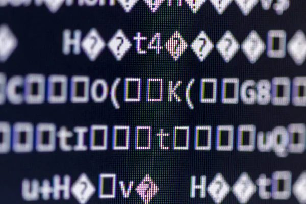 Close-up of random computer code comprised of numbers and letters.